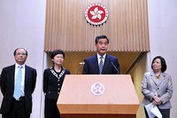 Chief Executive CY Leung announces the Government will shelve the Moral & National Education subject guidelines, with Secretary for Education Eddie Ng (first from left), Chief Secretary Carrie Lam (second from left) , and Committee on the Implementation of Moral & National Education Chairperson Anna Wu (fourth from left). 
