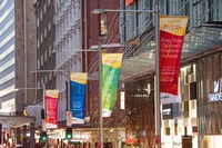 Street banners in Sydney CBD promoting Hong Kong SAR 15th Anniversary celebrations.