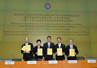 Hong Kong Chief Executive, Mr C Y Leung (centre); the Chief Secretary for Administration, Mrs Carrie Lam (second left); the Secretary for Justice, Mr Rimsky Yuen, SC (second right); the Secretary for Constitutional and Mainland Affairs, Mr Raymond Tam (first left); and the Under Secretary for Constitutional and Mainland Affairs, Mr Lau Kong-wah (first right), at the press conference on the release of constitutional development public consultation reports at Central Government Offices on 15 July.